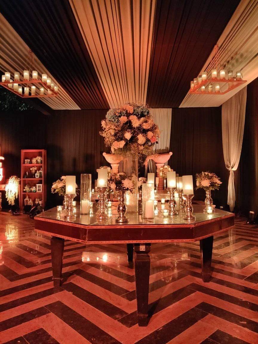 Premium destination wedding decor in Noida Sector 31 featuring royal gold accents and floral hangings.